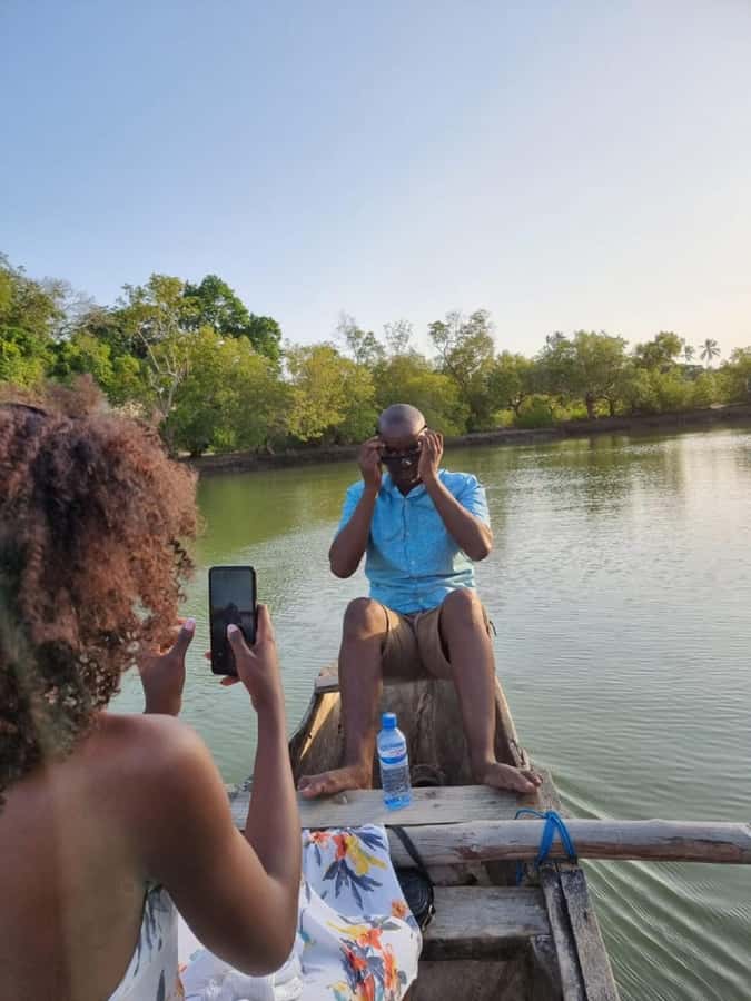 Diani Beach: Kongo River Estuary Sundowner Boat Tour - Boarding the canoe at Kongo River