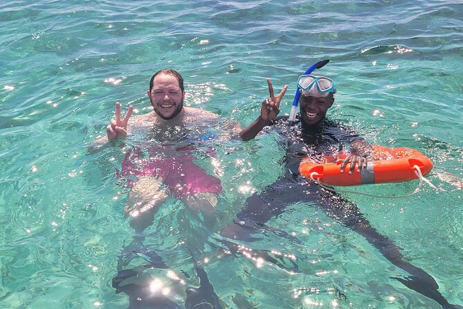 Full Day Dolphin Watching with Snorkeling in Wasini - Snorkeling with equipment provided