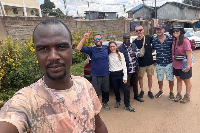 Kevins Kibera Slum Tours - Walking the main streets, paths, and train track area