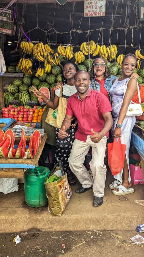 Local Market Tour and Traditional Meal Cooking Class - Sitting down to a Kenyan meal