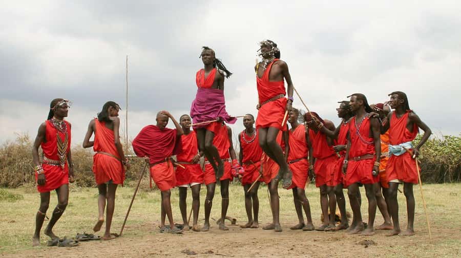 Masai Village Cultural Day Tour from Nairobi - Entering the village with song and ceremony