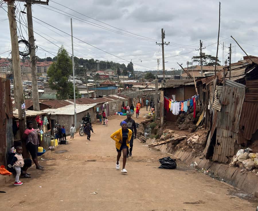 Nairobi: Explore Kibera Slum with Local Guides - Safety, photography, and respectful conduct