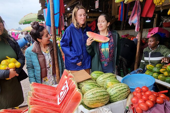 Traditional Kenyan Cooking Class & Local Market Tour - Sitting down to eat what you made