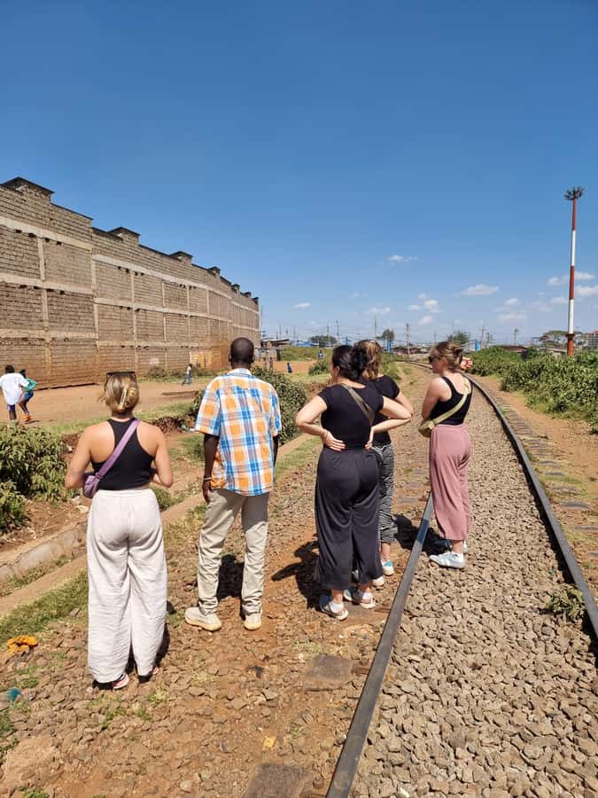 Visit Kibera The Largest Slum With a Local - Food, tea, and conversation with local workers